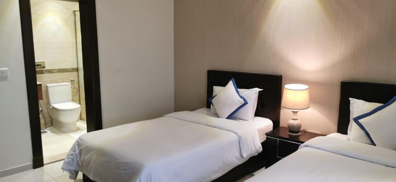 Beach Time Villas Hotel Yidda Exterior foto